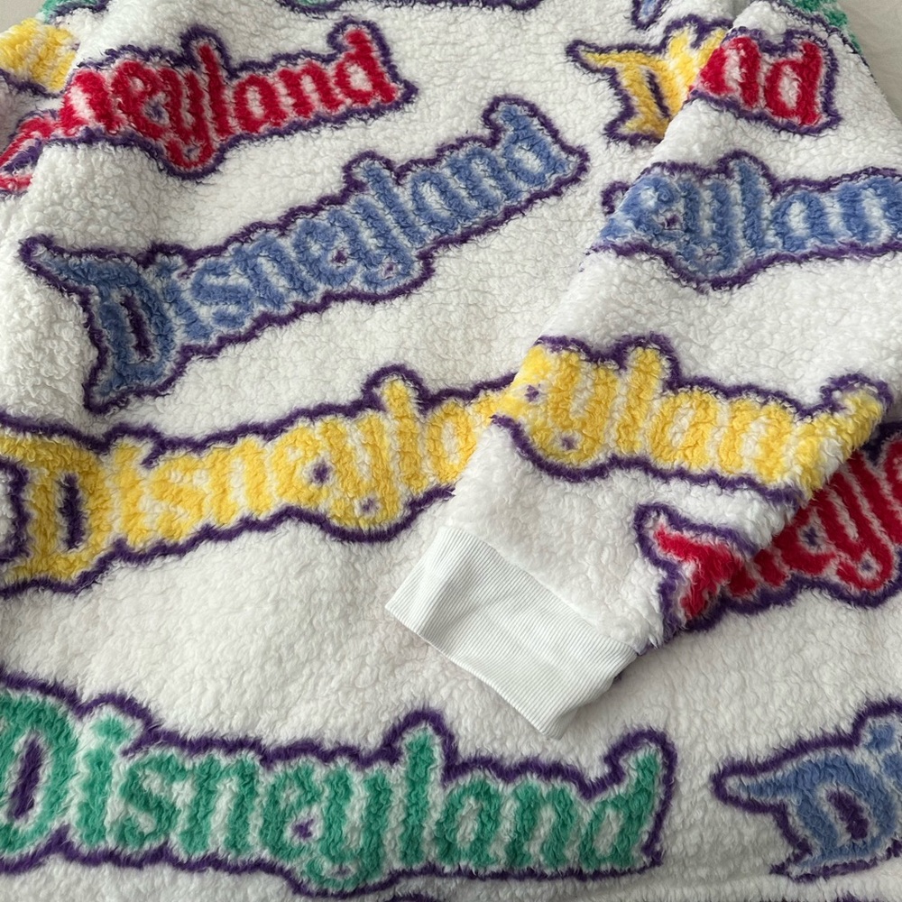Disney fleece jersey. Excellent condition worn once.